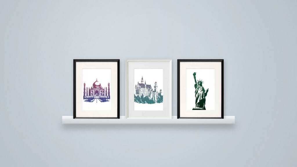Ręcznie odbijane grafiki z Taj Mahal, zamkiem Książ i Statuą Wolności na białej półce